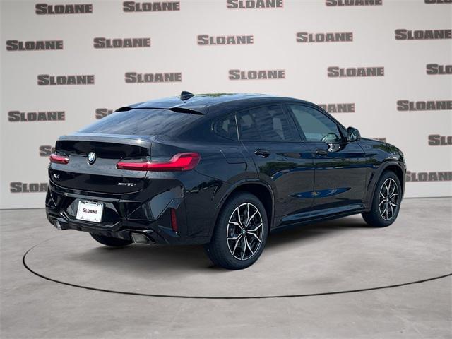 Photo of 2025 Black Sapphire Metallic BMW X4