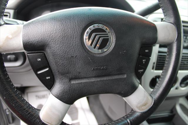Photo of 2002 Black Clearcoat/Light Mineral Gray Metallic Mercury Mountaineer