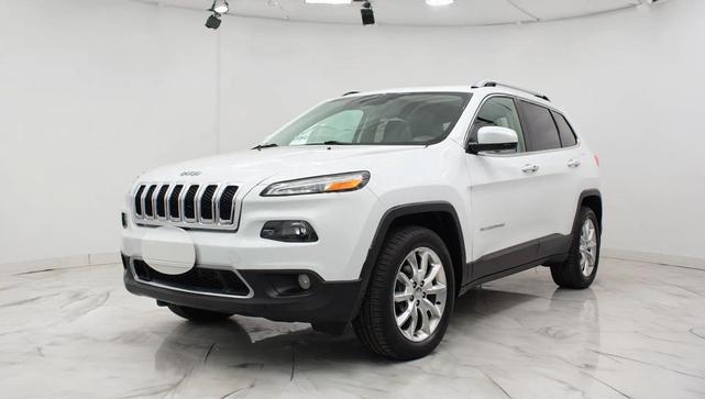 Photo of 2015 Bright White Clearcoat Jeep Cherokee