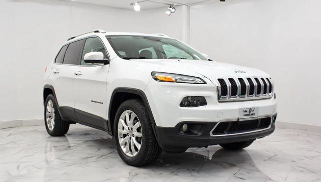 Photo of 2015 Bright White Clearcoat Jeep Cherokee