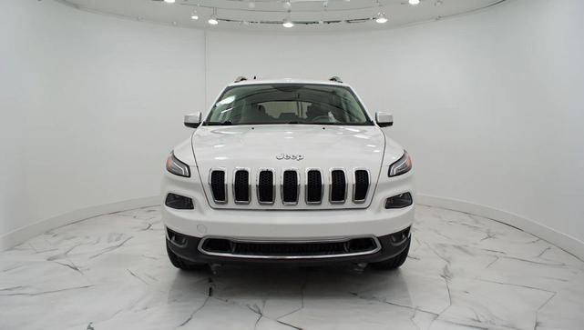 Photo of 2015 Bright White Clearcoat Jeep Cherokee