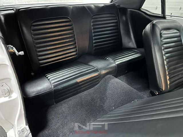 Photo of 1966 White Ford Mustang