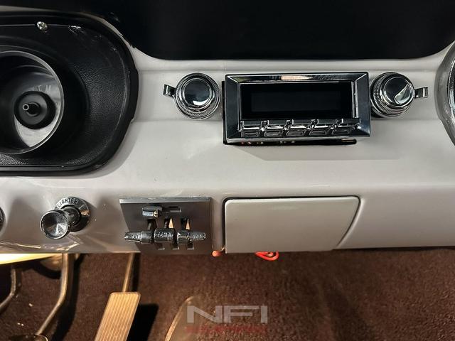 Photo of 1966 White Ford Mustang