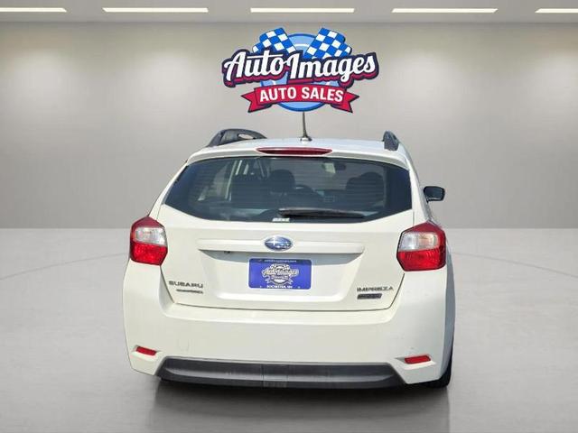 Photo of 2015 Pearl White Subaru Impreza