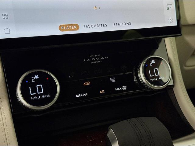 Photo of 2026 Ostuni Pearl White Jaguar F-PACE