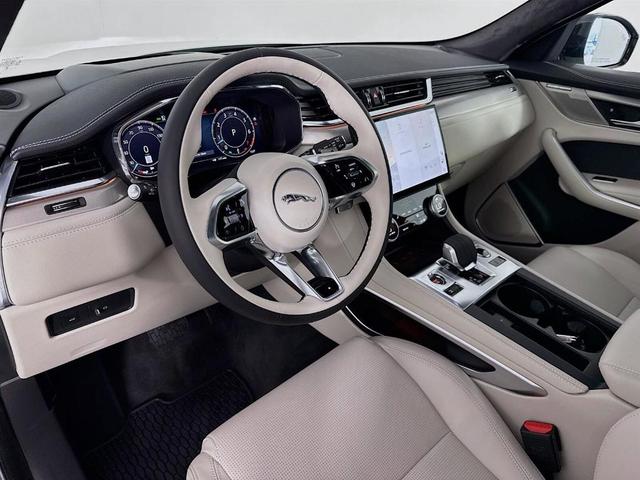 Photo of 2026 Ostuni Pearl White Jaguar F-PACE