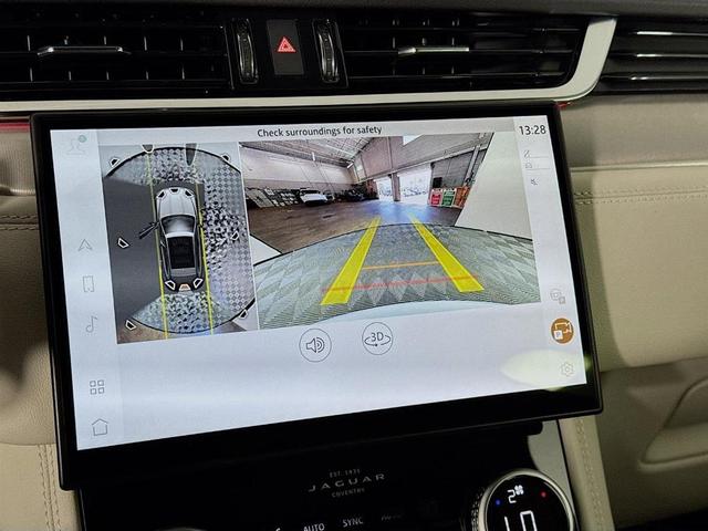 Photo of 2026 Ostuni Pearl White Jaguar F-PACE