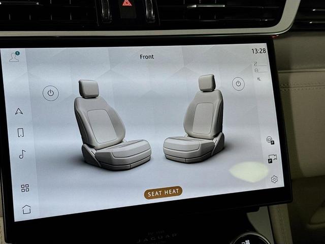 Photo of 2026 Ostuni Pearl White Jaguar F-PACE