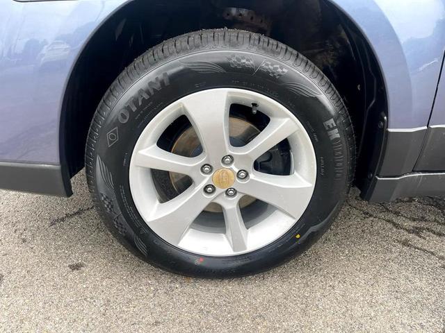 Photo of 2014 Blue Subaru Outback