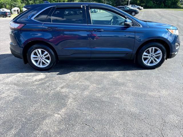 Photo of 2017 Blue Jeans Metallic Ford Edge