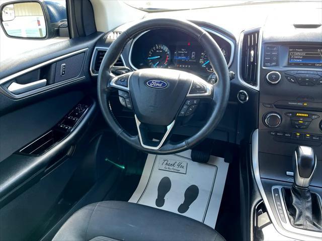 Photo of 2017 Blue Jeans Metallic Ford Edge