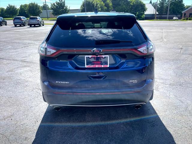 Photo of 2017 Blue Jeans Metallic Ford Edge