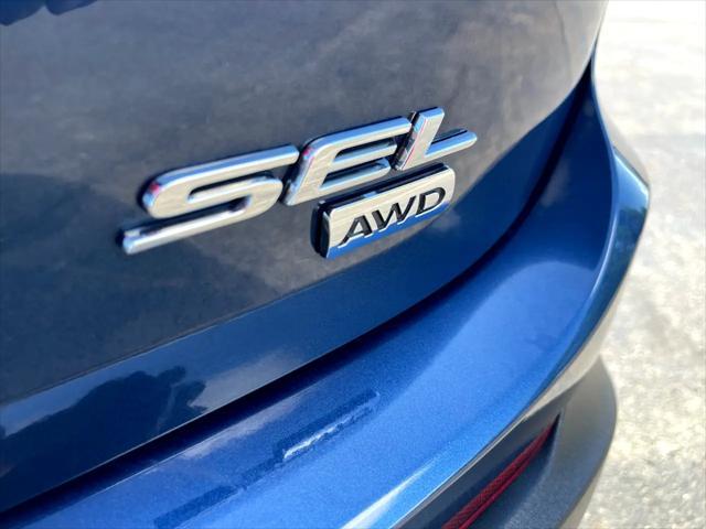 Photo of 2017 Blue Jeans Metallic Ford Edge