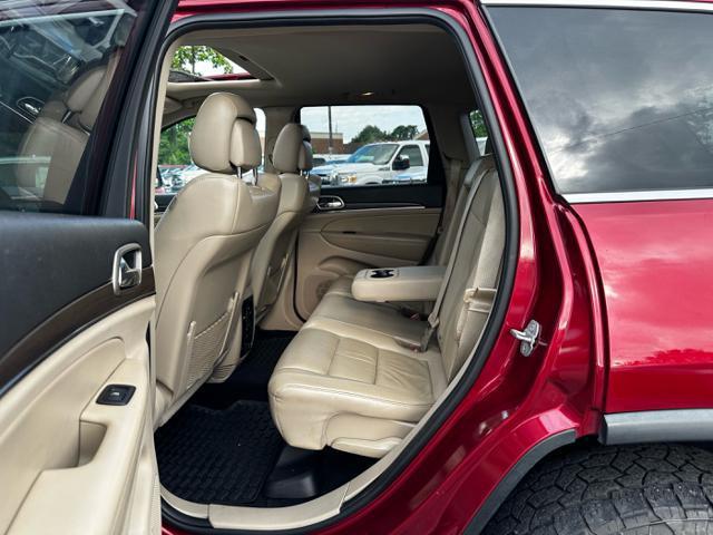 Photo of 2014 Deep Cherry Red Crystal Pearlcoat Jeep Grand Cherokee