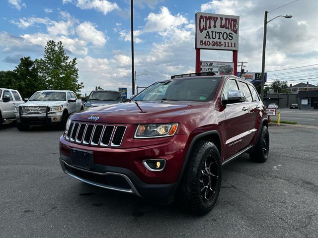 Photo of 2014 Deep Cherry Red Crystal Pearlcoat Jeep Grand Cherokee
