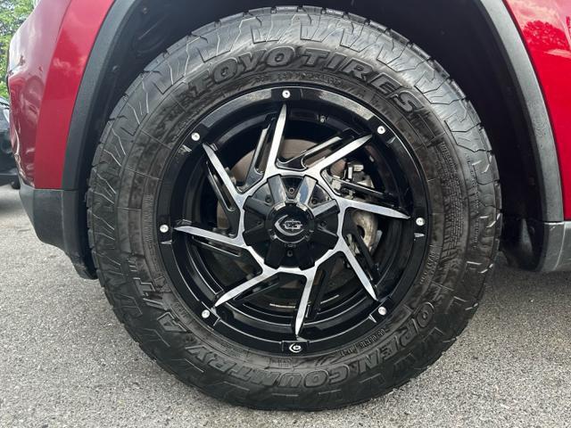 Photo of 2014 Deep Cherry Red Crystal Pearlcoat Jeep Grand Cherokee