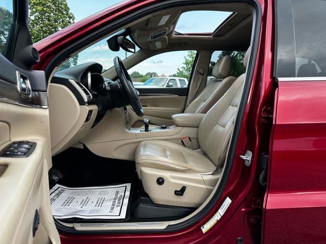 Photo of 2014 Deep Cherry Red Crystal Pearlcoat Jeep Grand Cherokee