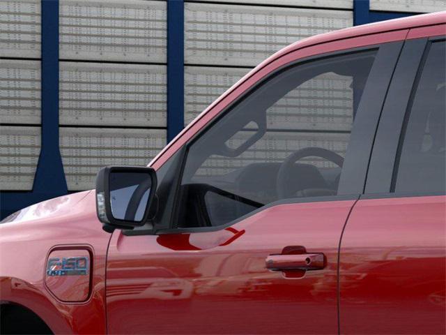 Photo of 2025 Red Metallic Ford F-150 Lightning