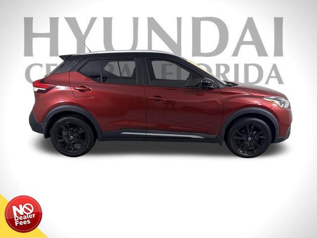 Photo of 2019 Cayenne Red/Super Black Nissan Kicks