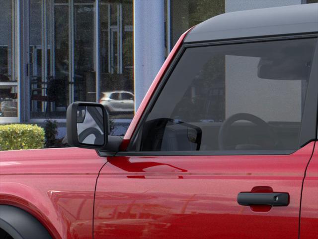 Photo of 2025 Ruby Red Metallic Tinted Clearcoat Ford Bronco