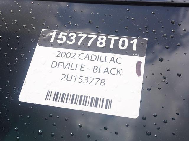 Photo of 2002 Sable Black Cadillac DeVille