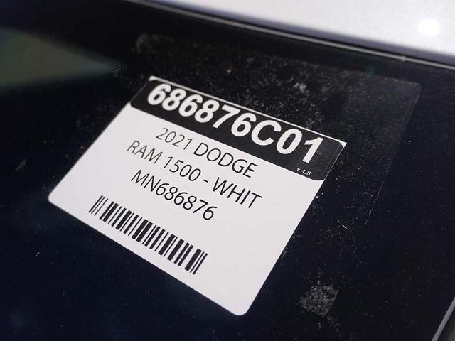 Photo of 2021 Ivory Tri-Coat Pearl RAM 1500