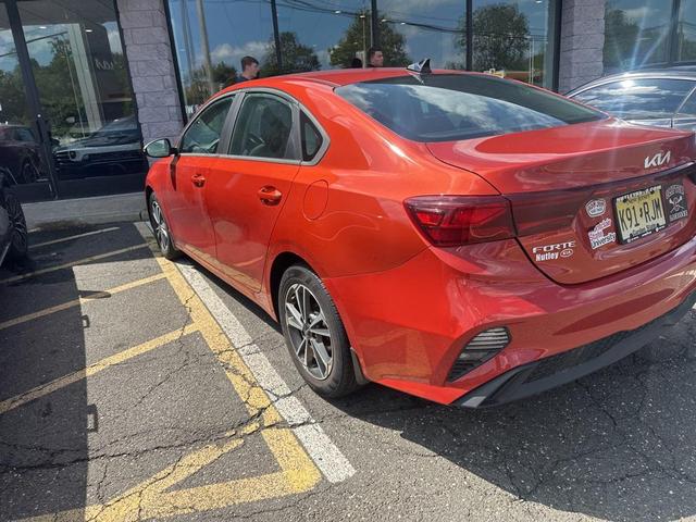 Photo of 2023 Fire Orange Kia Forte