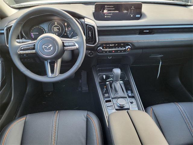 Photo of 2025 Blue Metallic Mazda CX-50 Hybrid