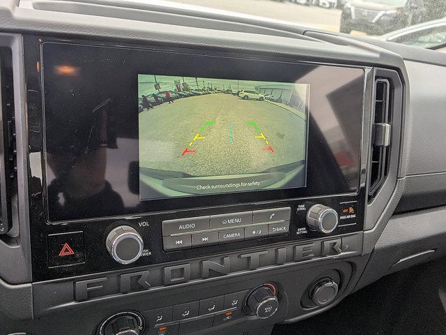Photo of 2025 Glacier White Nissan Frontier