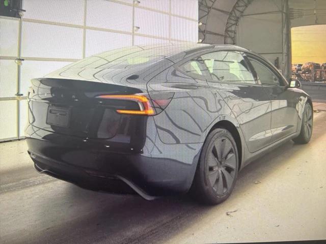 Photo of 2024 Stealth Grey Tesla Model 3