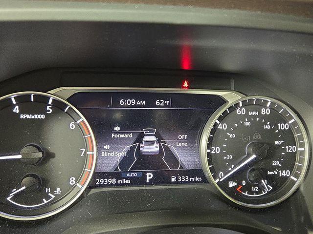 Photo of 2023 Pearl White Tricoat Nissan Rogue