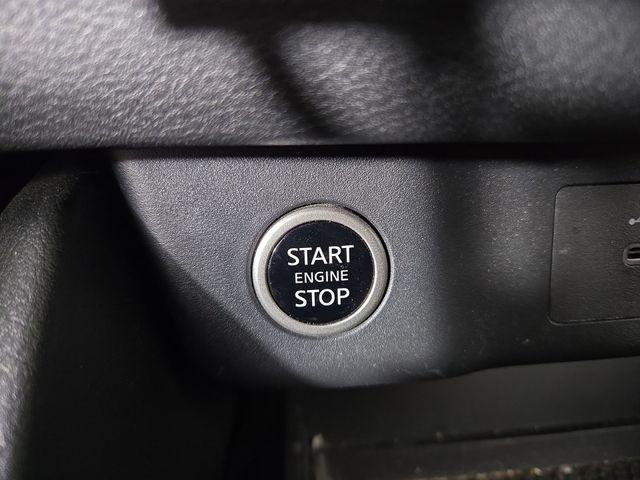 Photo of 2023 Pearl White Tricoat Nissan Rogue