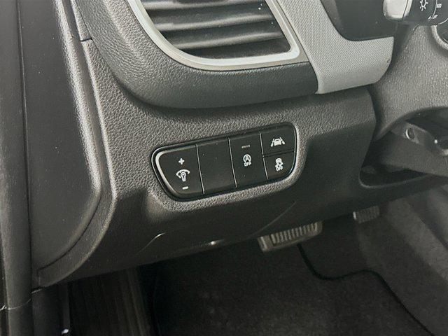 Photo of 2022 Cherry Black Kia Seltos