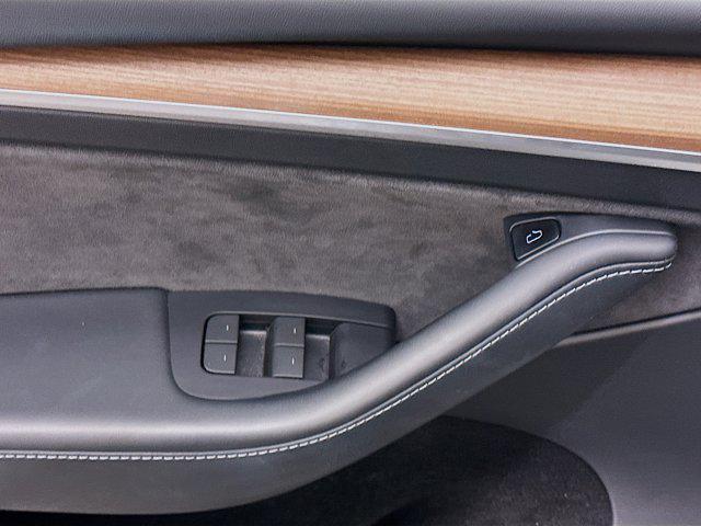 Photo of 2023 Pearl White Multi-Coat Tesla Model Y