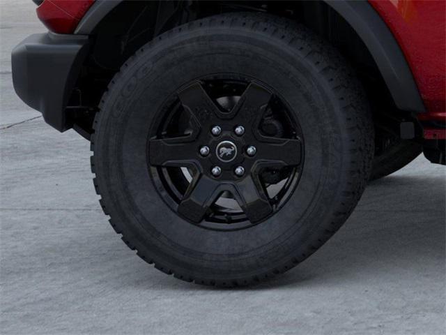 Photo of 2025 Ruby Red Metallic Tinted Clearcoat Ford Bronco