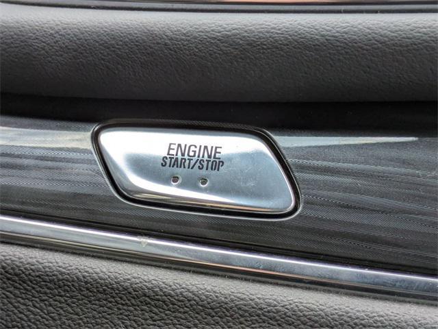 Photo of 2024 Cherry Red Tintcoat Buick Enclave