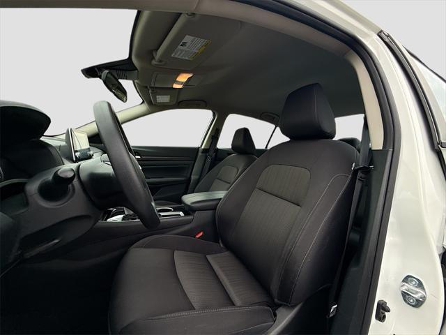 Photo of 2024 Pearl White Tricoat Nissan Altima