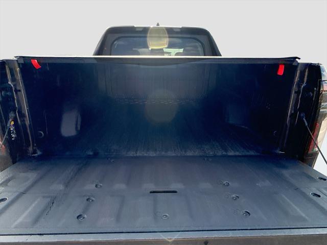 Photo of 2025 Onyx Black GMC Sierra EV