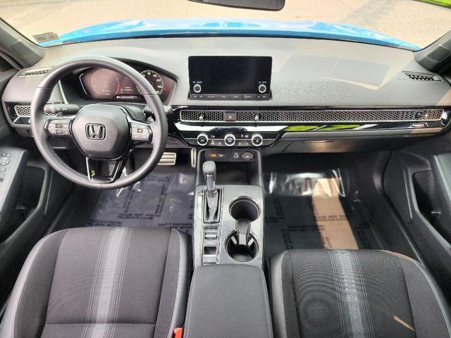 Photo of 2024 Boost Blue Pearl Honda Civic