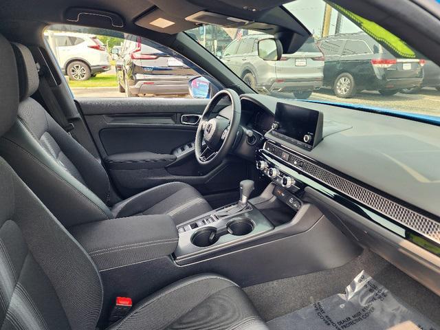 Photo of 2024 Boost Blue Pearl Honda Civic