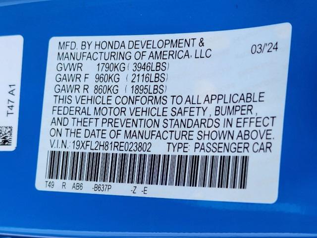 Photo of 2024 Boost Blue Pearl Honda Civic