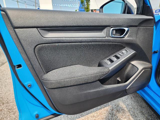 Photo of 2024 Boost Blue Pearl Honda Civic