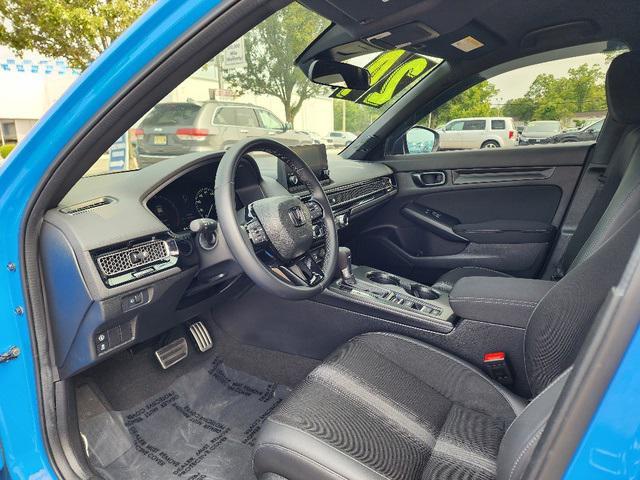 Photo of 2024 Boost Blue Pearl Honda Civic