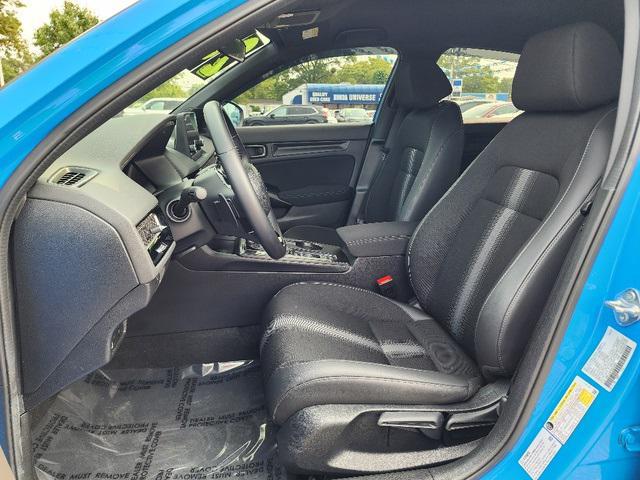 Photo of 2024 Boost Blue Pearl Honda Civic
