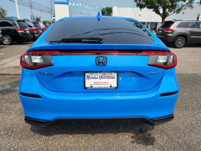 Photo of 2024 Boost Blue Pearl Honda Civic