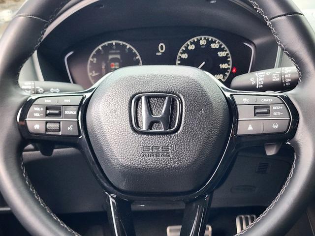 Photo of 2024 Boost Blue Pearl Honda Civic