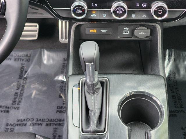 Photo of 2024 Boost Blue Pearl Honda Civic