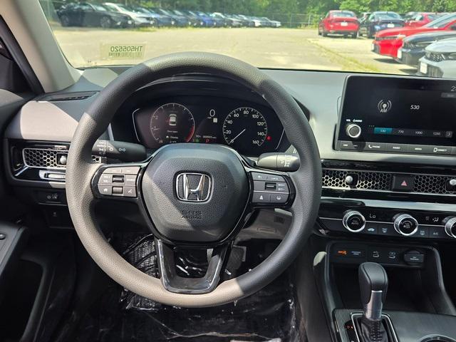 Photo of 2026 Blue Lagoon Pearl Honda Civic