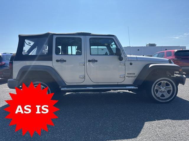 Photo of 2010 Bright Silver Metallic Clearcoat Jeep Wrangler Unlimited