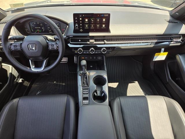 Photo of 2025 Solar Silver Metallic Honda Civic Hybrid